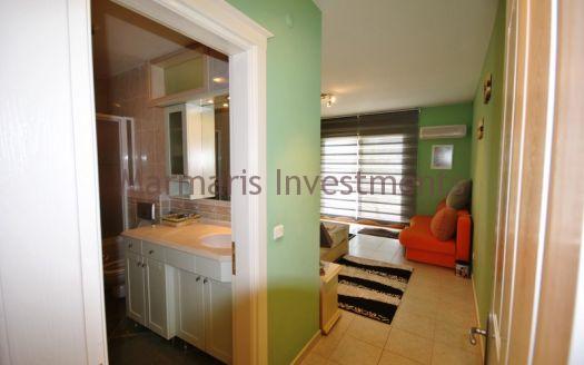 Stylish Modern Apartment for sale in Turunc with a communal swimming pool