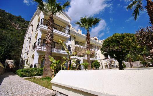 Stylish Modern Apartment for sale in Turunc with a communal swimming pool