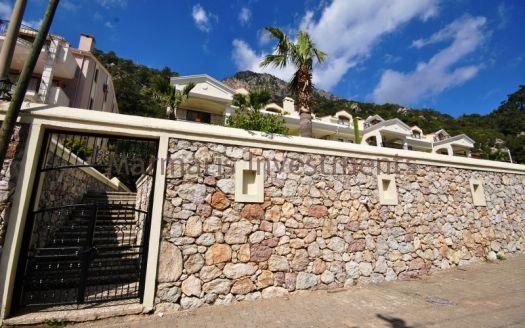 Stylish Modern Apartment for sale in Turunc with a communal swimming pool