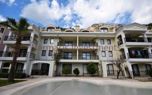 Stylish Modern Apartment for sale in Turunc with a communal swimming pool