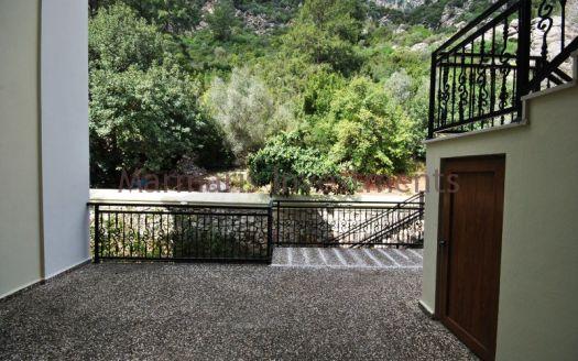 Stylish Modern Apartment for sale in Turunc with a communal swimming pool