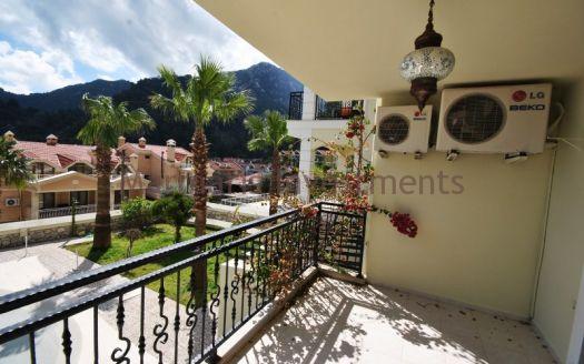 Stylish Modern Apartment for sale in Turunc with a communal swimming pool