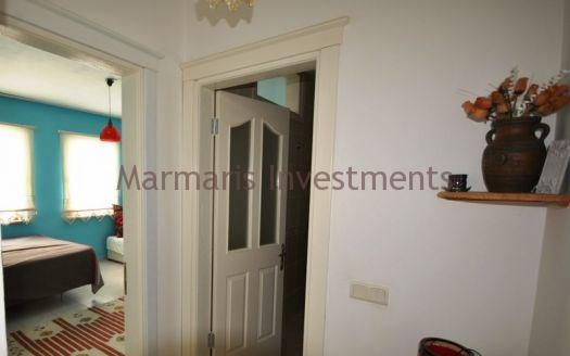 Stylish Modern Apartment for sale in Turunc with a communal swimming pool