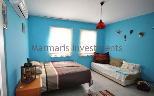 Stylish Modern Apartment for sale in Turunc with a communal swimming pool