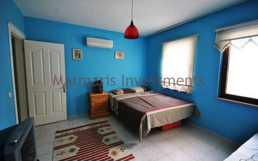 Stylish Modern Apartment for sale in Turunc with a communal swimming pool