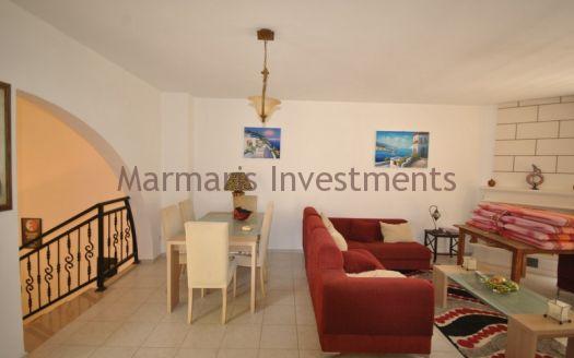 Stylish Modern Apartment for sale in Turunc with a communal swimming pool