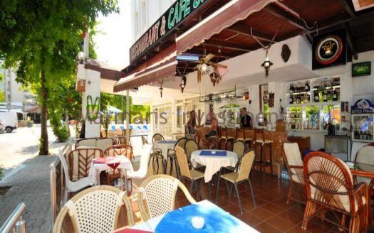The 21 room hotel for sale with its outdoor restaurant and bar in Icmeler