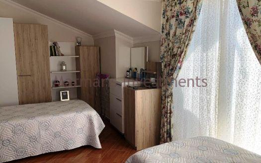 The Spacious apartment for sale in Icmeler with swimming pool.