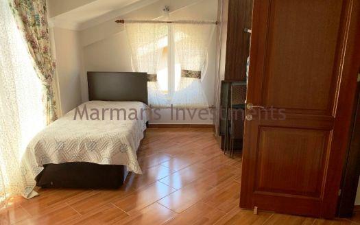 The Spacious apartment for sale in Icmeler with swimming pool.