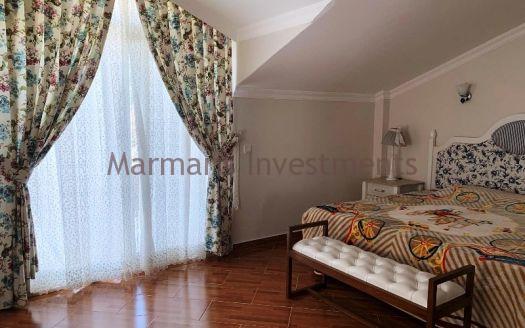 The Spacious apartment for sale in Icmeler with swimming pool.