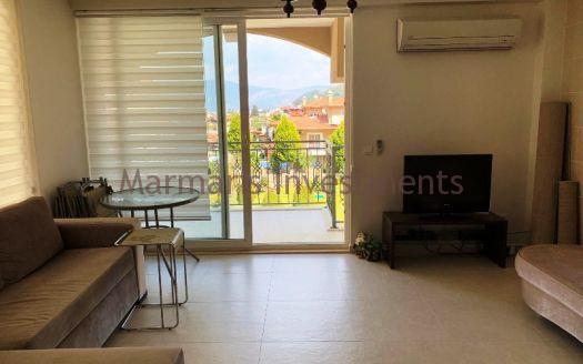 The Spacious apartment for sale in Icmeler with swimming pool.