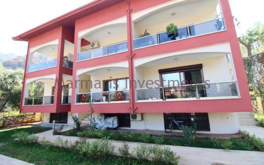 2 Bedroom and the family apartment available for sale within Icmeler with a pool is offered.