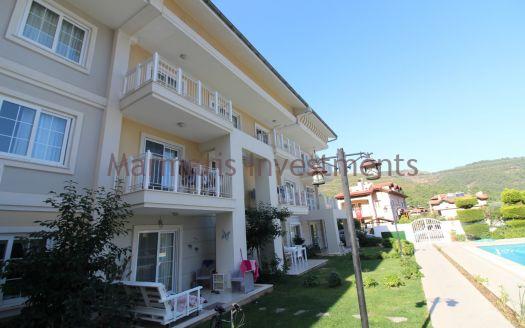 The Icmeler 3 bedroom apartment with a pool is now available for sale.