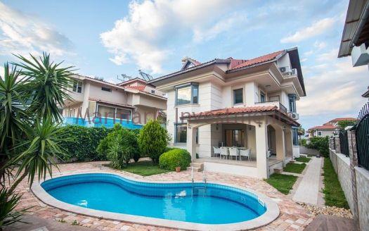 A luxury vacation home for sale in Marmaris Icmeler with a private swimming pool and garden