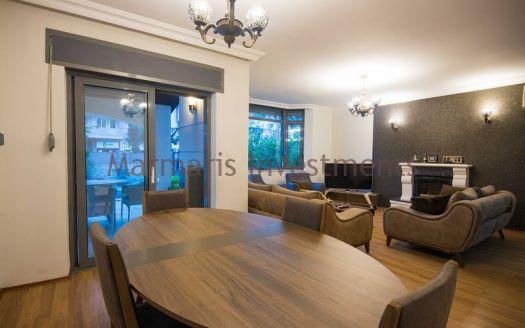 A luxury vacation home for sale in Marmaris Icmeler with a private swimming pool and garden