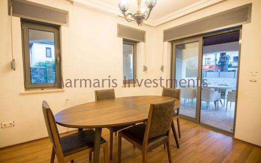 A luxury vacation home for sale in Marmaris Icmeler with a private swimming pool and garden