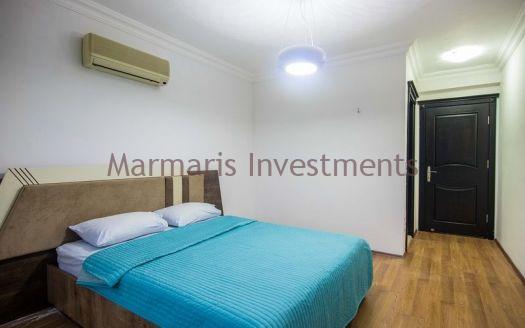 A luxury vacation home for sale in Marmaris Icmeler with a private swimming pool and garden