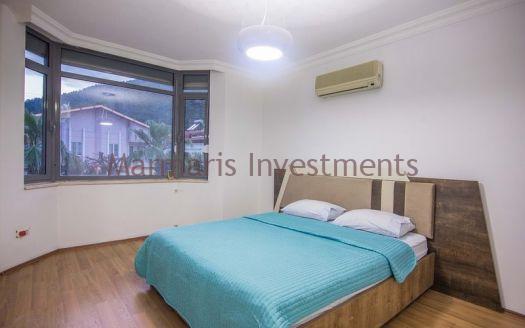 A luxury vacation home for sale in Marmaris Icmeler with a private swimming pool and garden