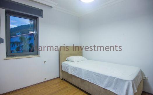 A luxury vacation home for sale in Marmaris Icmeler with a private swimming pool and garden