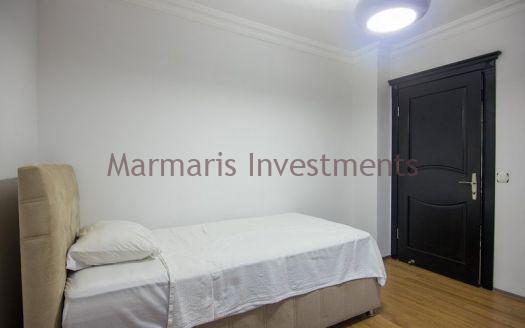 A luxury vacation home for sale in Marmaris Icmeler with a private swimming pool and garden